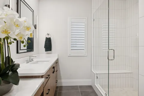 a bedroom with a bed and a table in it