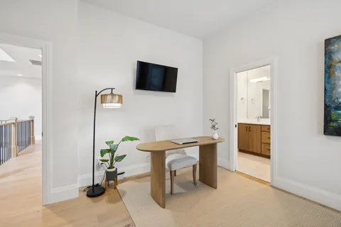 a bathroom with a sink and mirror
