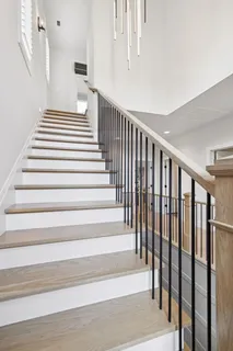 a view of a balcony with wooden floor