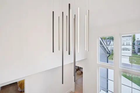 a view of balcony with wooden floor and fence