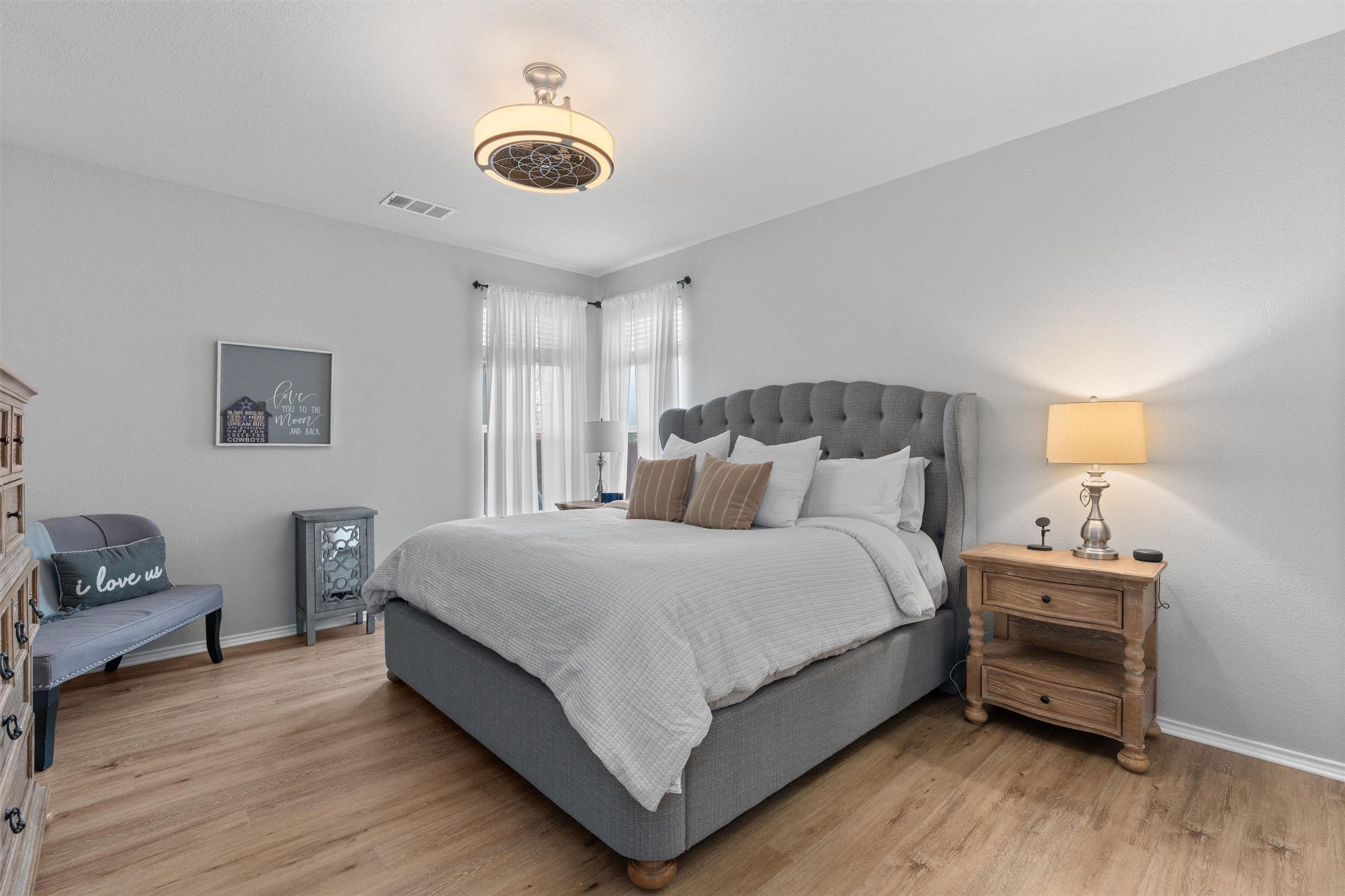 338 Altamont Street Hutto, TX 78634 - Photo 14 of 40 Bedroom with light wood-type flooring and baseboards