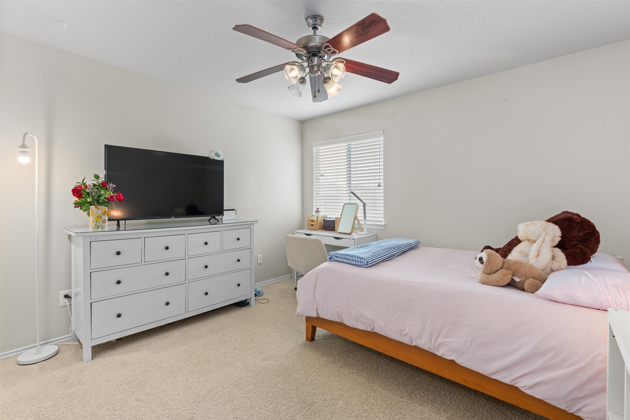338 Altamont Street Hutto, TX 78634 - Photo 24 of 40 Bedroom featuring carpet flooring and ceiling fan