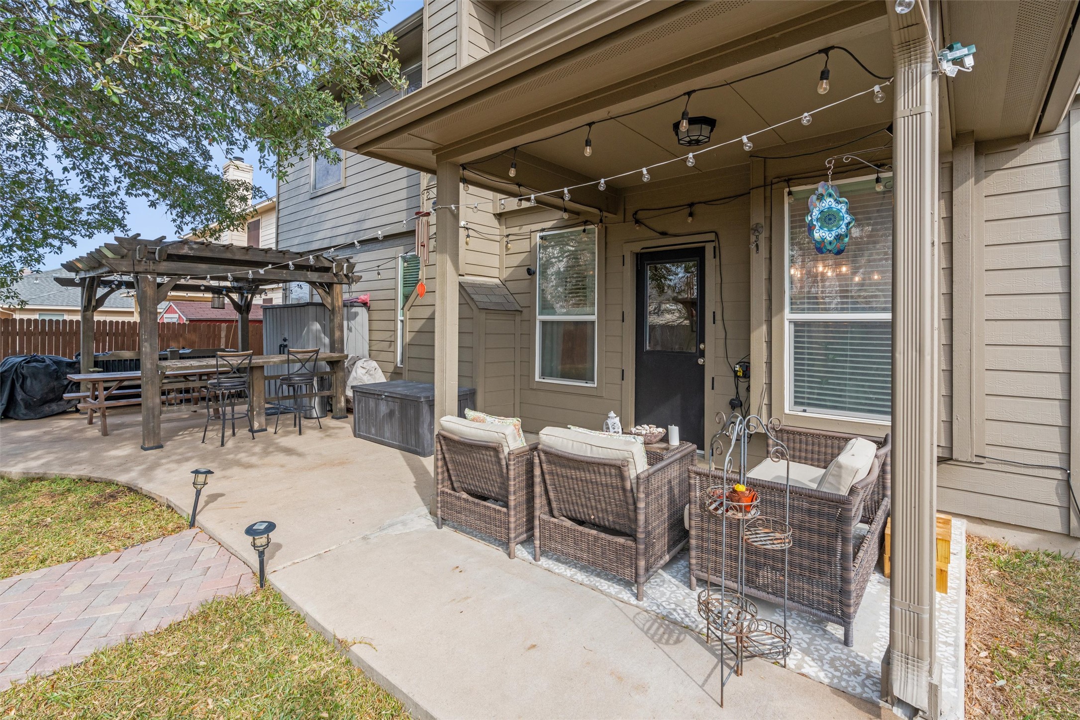 338 Altamont Street Hutto, TX 78634 - Photo 30 of 40 View of patio / terrace with an outdoor living / dining area, a grill, and a pergola