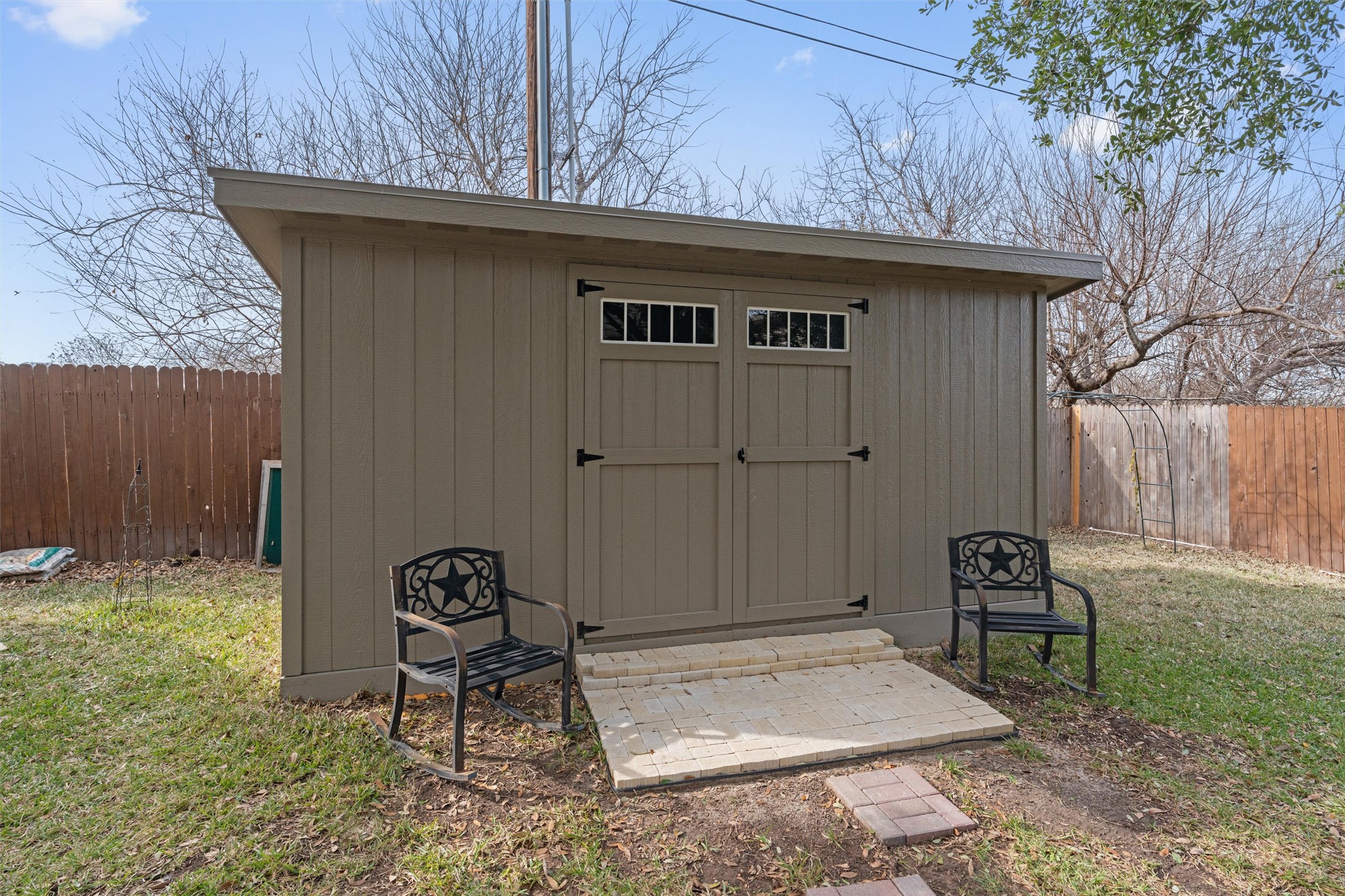 338 Altamont Street Hutto, TX 78634 - Photo 34 of 40 View of shed with a fenced backyard
