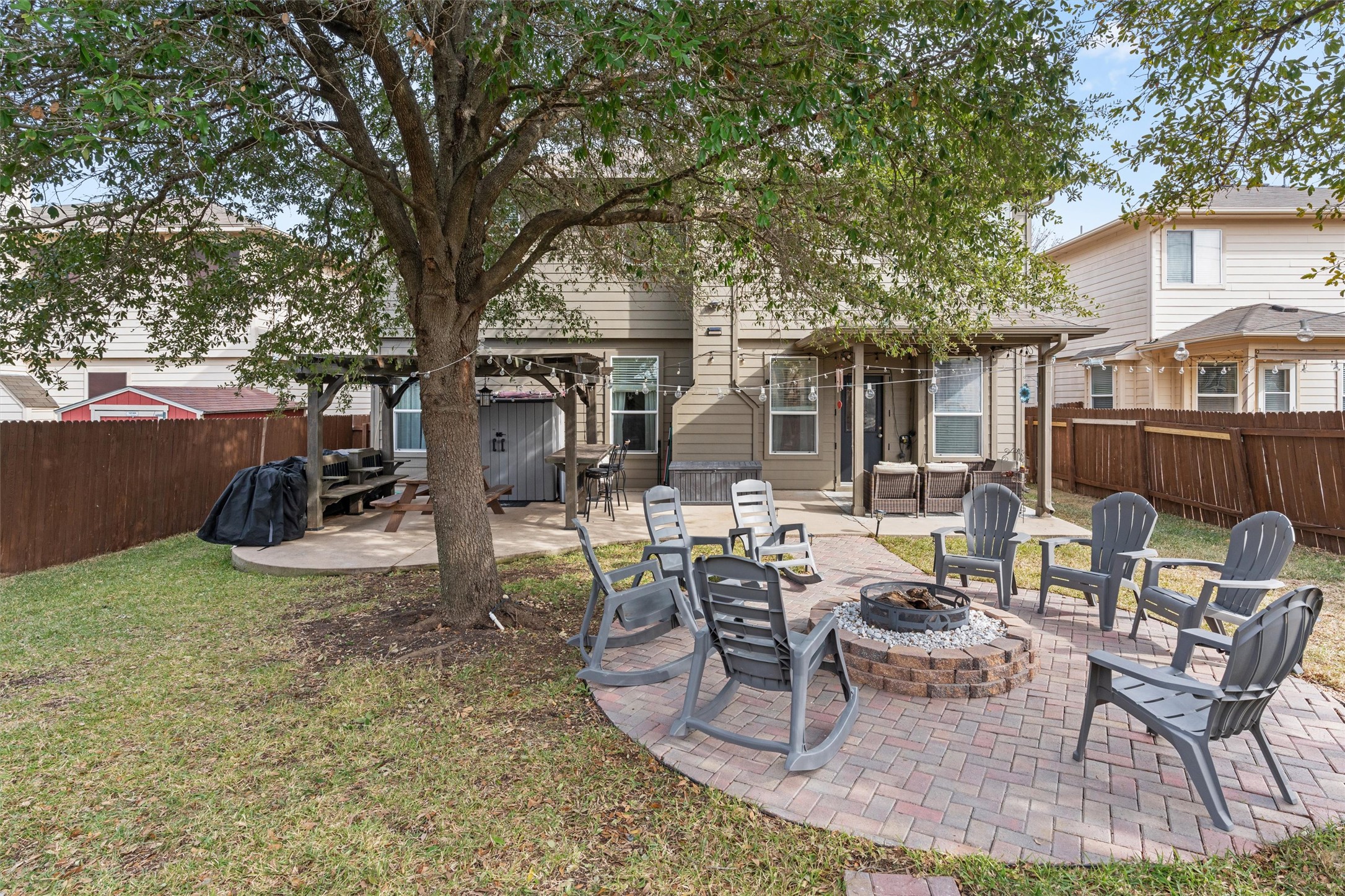 338 Altamont Street Hutto, TX 78634 - Photo 35 of 40 Rear view of property featuring a patio and a fenced backyard