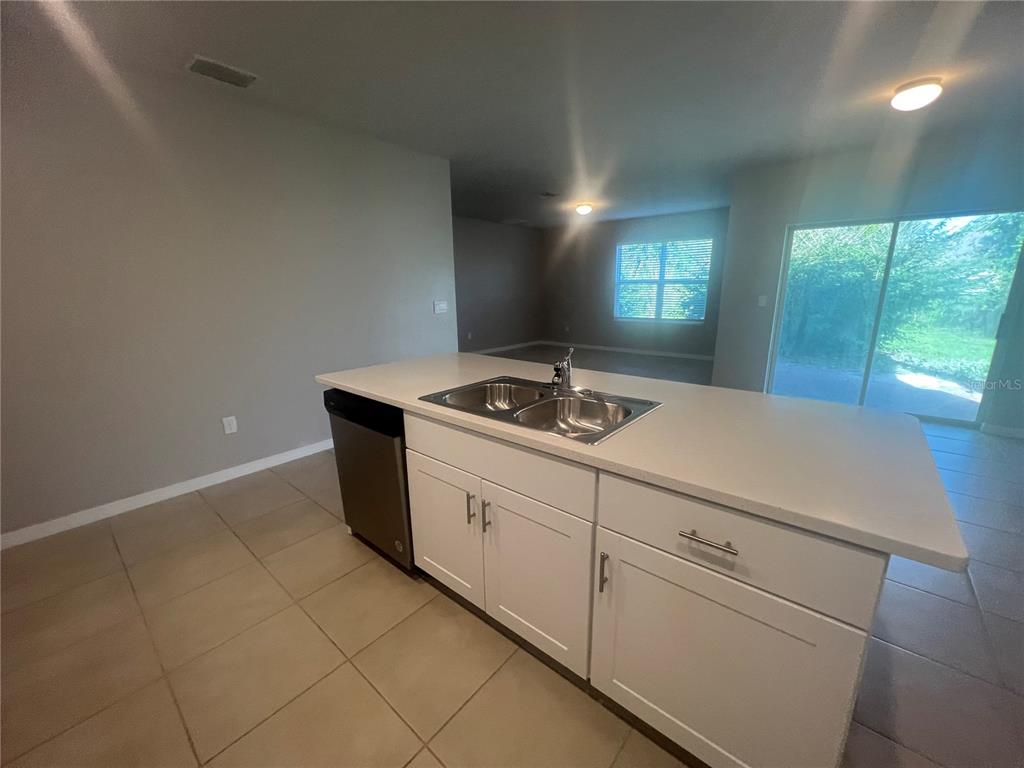 280 Perute Court Punta Gorda, FL 33983 - Photo 21 of 31 a room with storage and utility