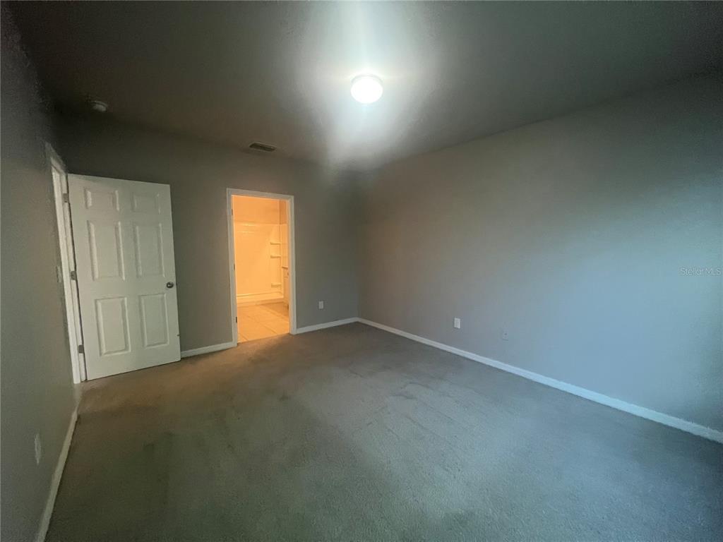 280 Perute Court Punta Gorda, FL 33983 - Photo 25 of 31 an empty room with windows