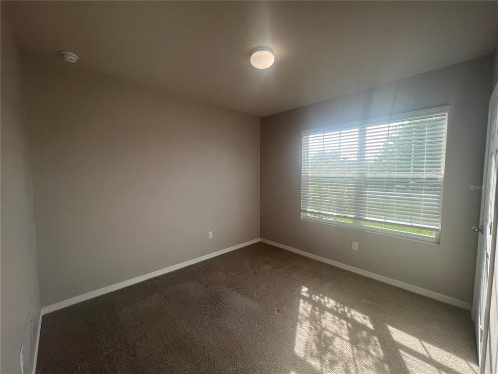 280 Perute Court Punta Gorda, FL 33983 - Photo 4 of 31 an empty room with a window