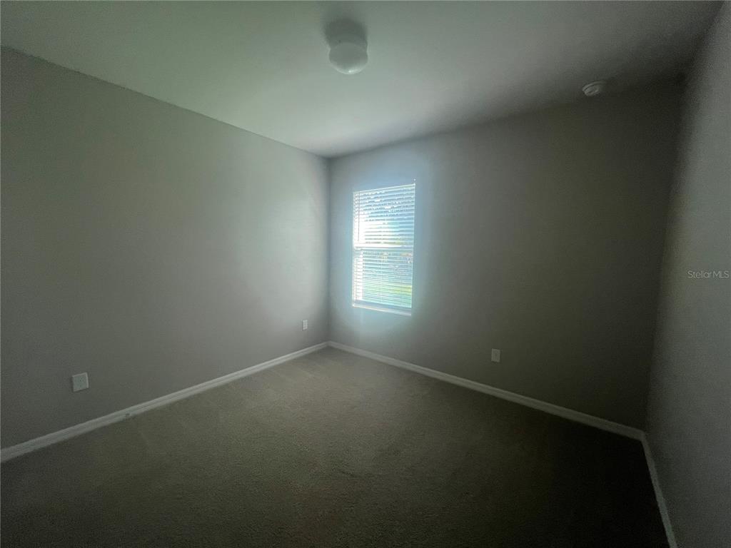 280 Perute Court Punta Gorda, FL 33983 - Photo 9 of 31 an empty room with a window