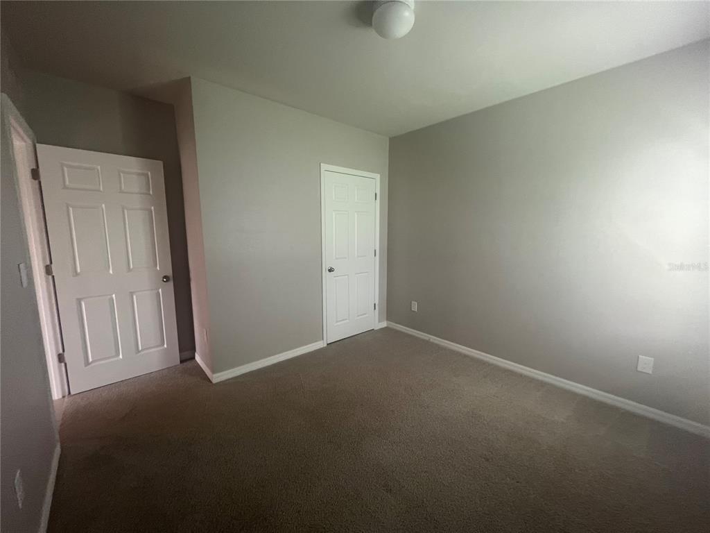 280 Perute Court Punta Gorda, FL 33983 - Photo 10 of 31 an empty room with windows