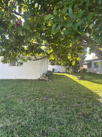a view of outdoor space and yard