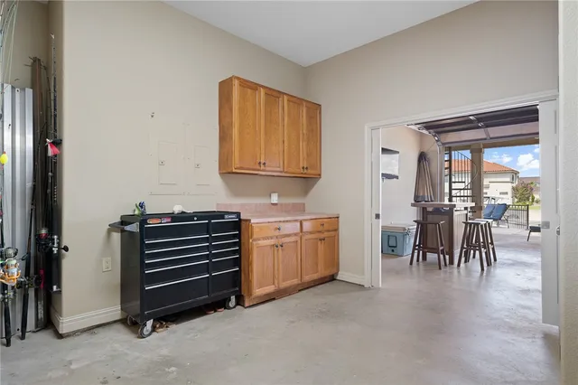 a view of dining room with furniture and a window