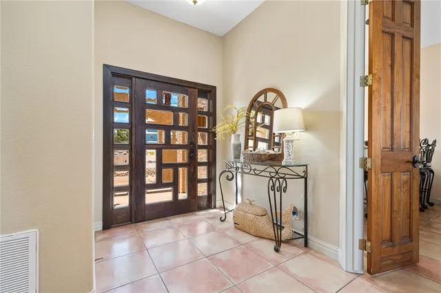 a view of a room that has a bench in it