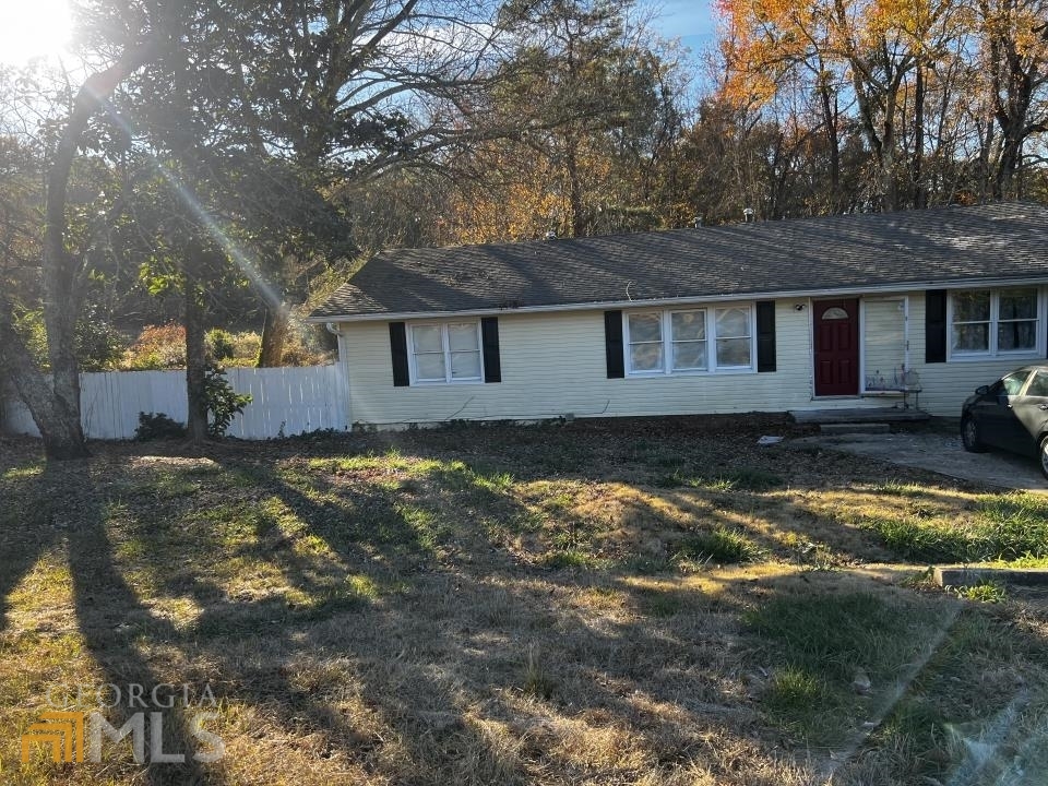 12224 Flat Shoals Road Covington, GA 30016 - Photo 1 of 1 front view of a house with a yard