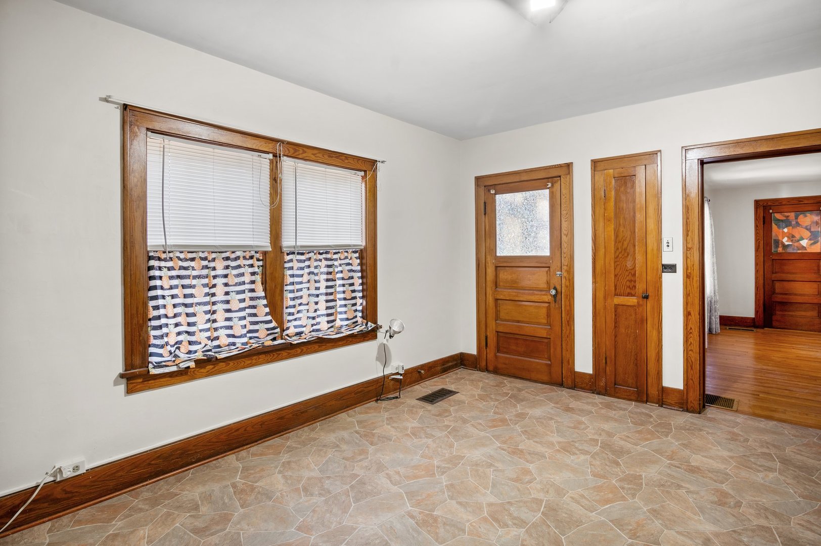 803 South 3rd Street, Unit 1 St. Charles, IL 60174 - Photo 10 of 16 an empty room with windows