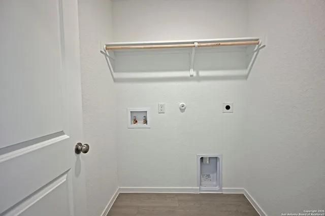 a view of small space with racks on the wall