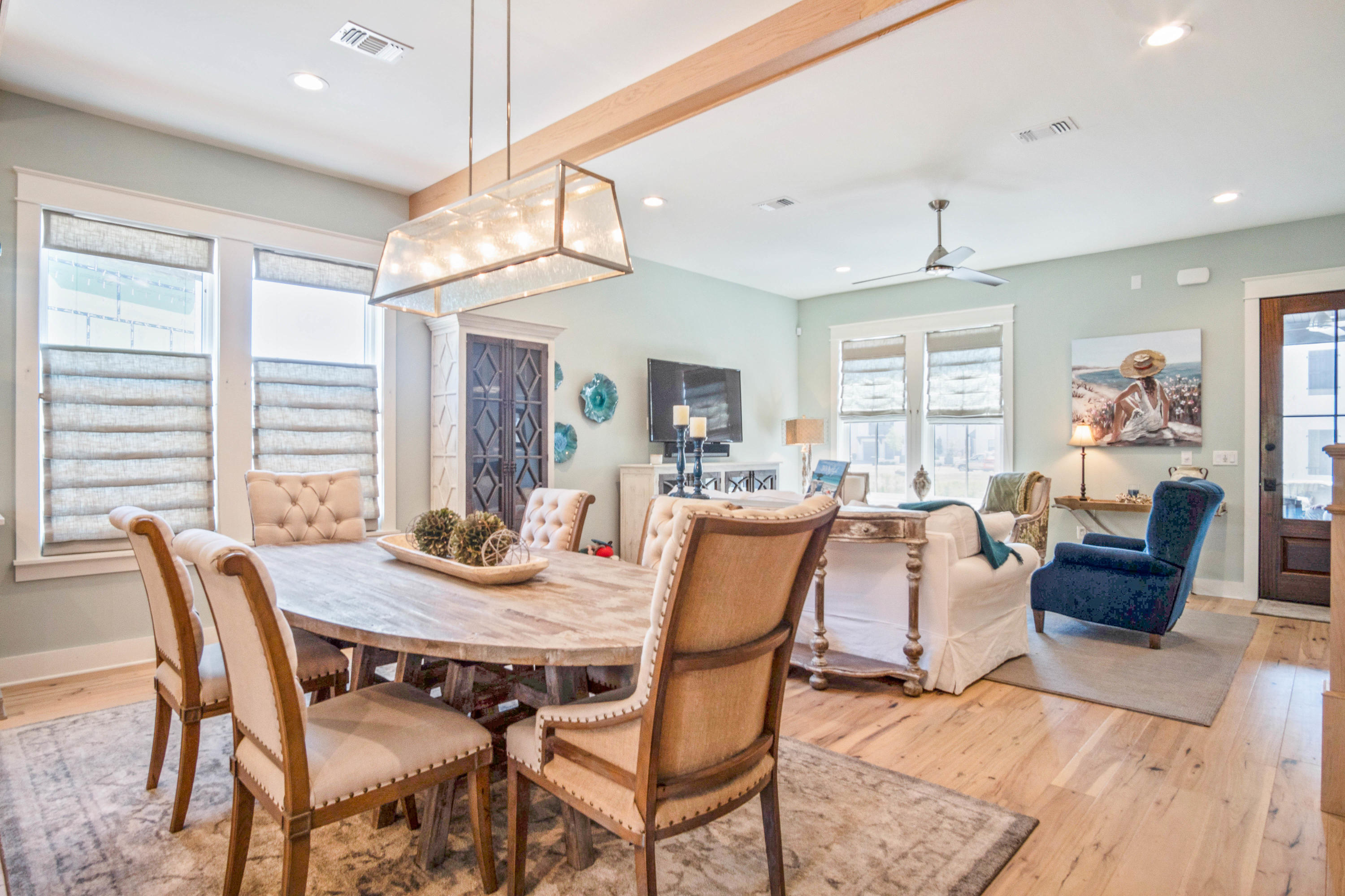 265 Ridgewalk Circle Santa Rosa Beach, FL 32459 - Photo 13 of 62 a view of a dining room with furniture window and wooden floor