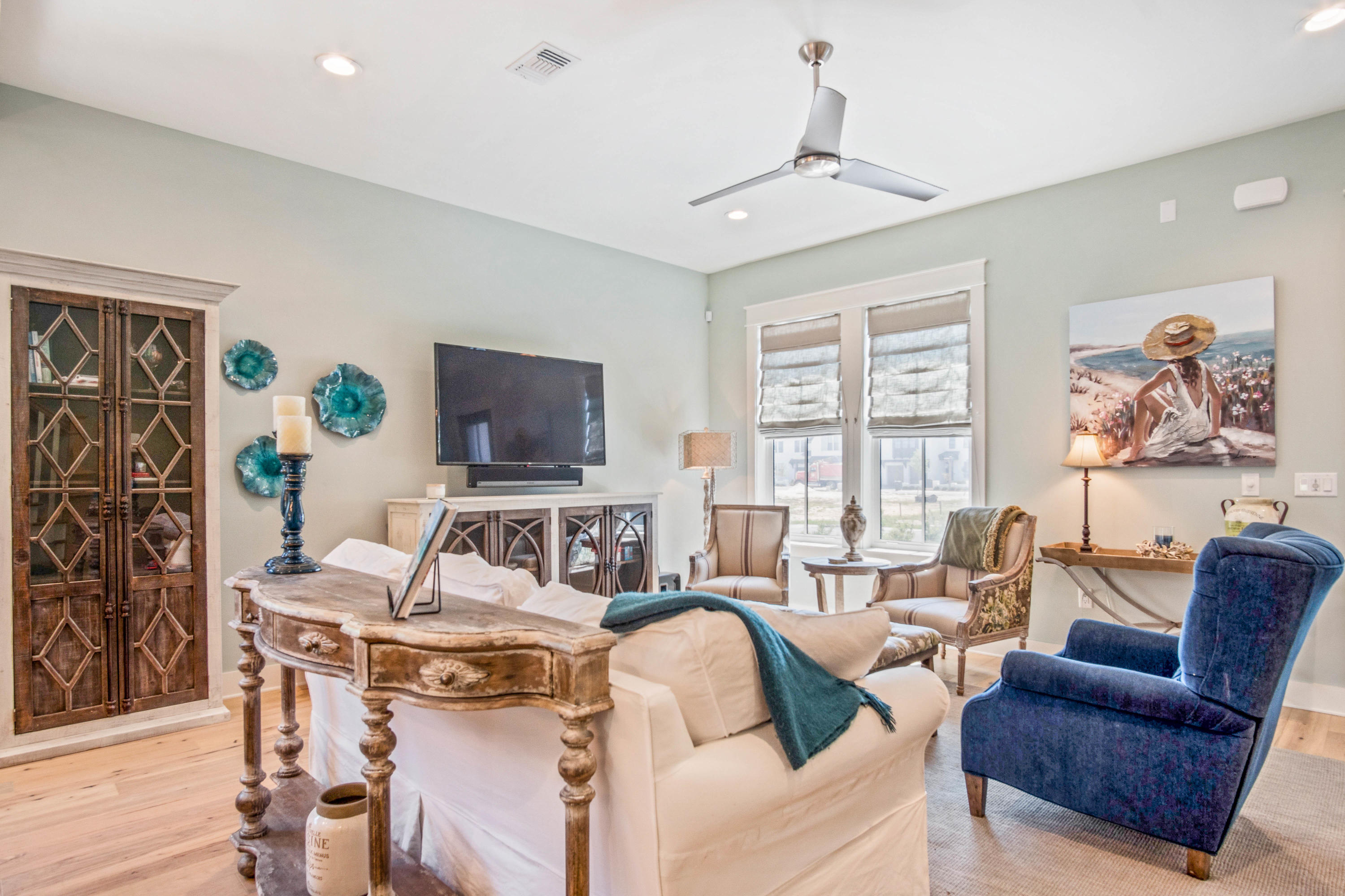 265 Ridgewalk Circle Santa Rosa Beach, FL 32459 - Photo 17 of 62 a living room with furniture and a flat screen tv