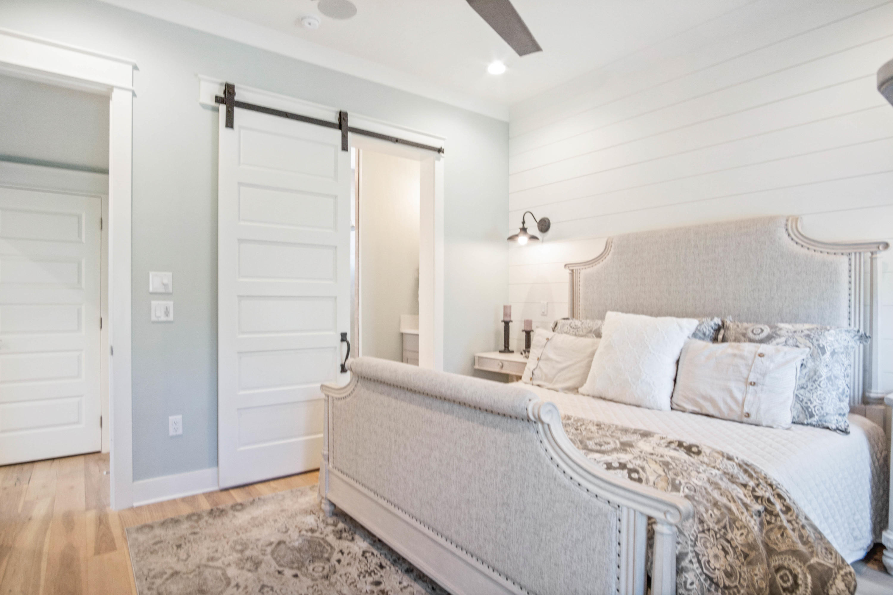 265 Ridgewalk Circle Santa Rosa Beach, FL 32459 - Photo 19 of 62 a bedroom with a bed and a walk in closet