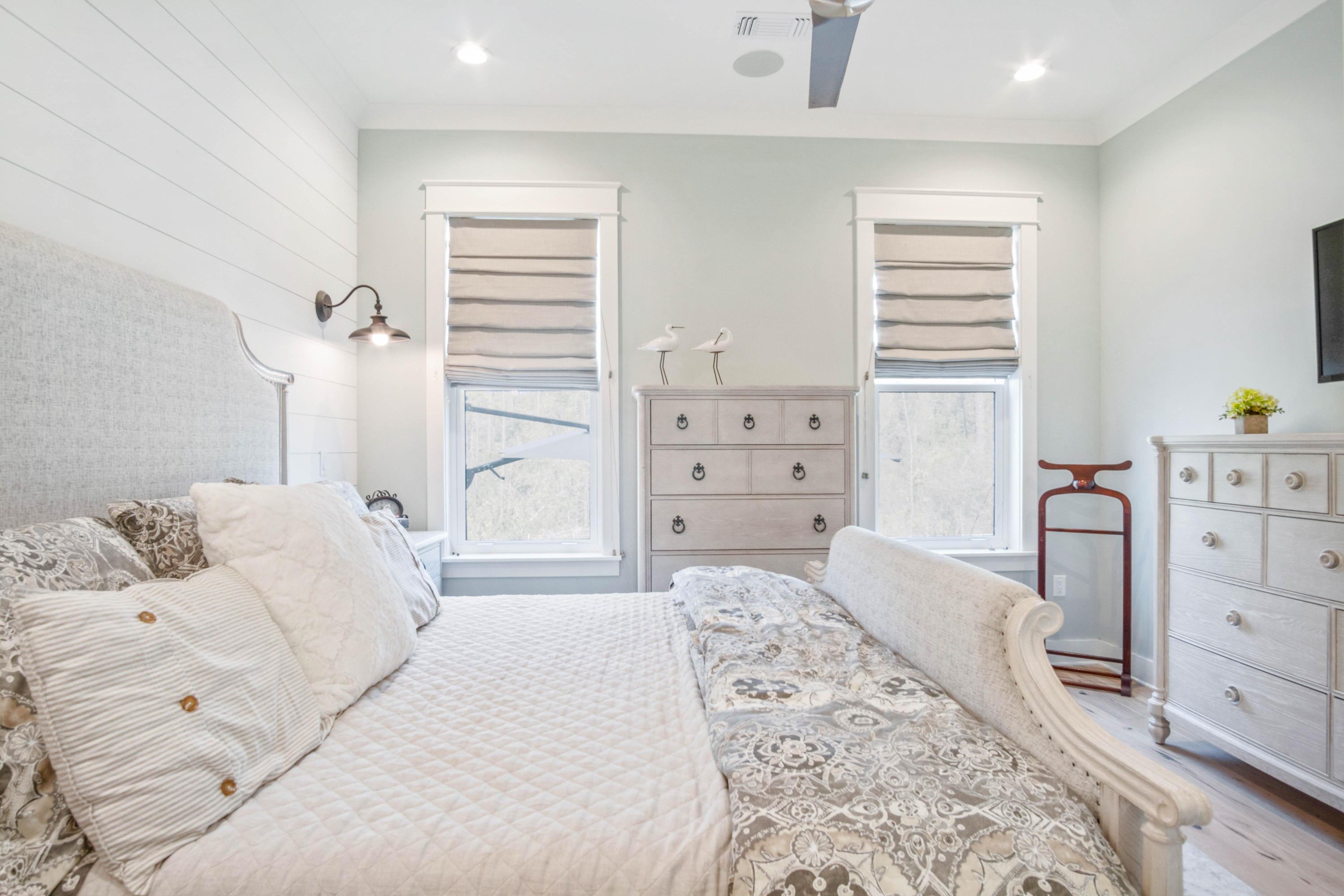 265 Ridgewalk Circle Santa Rosa Beach, FL 32459 - Photo 26 of 62 a bedroom with a bed a table and chair