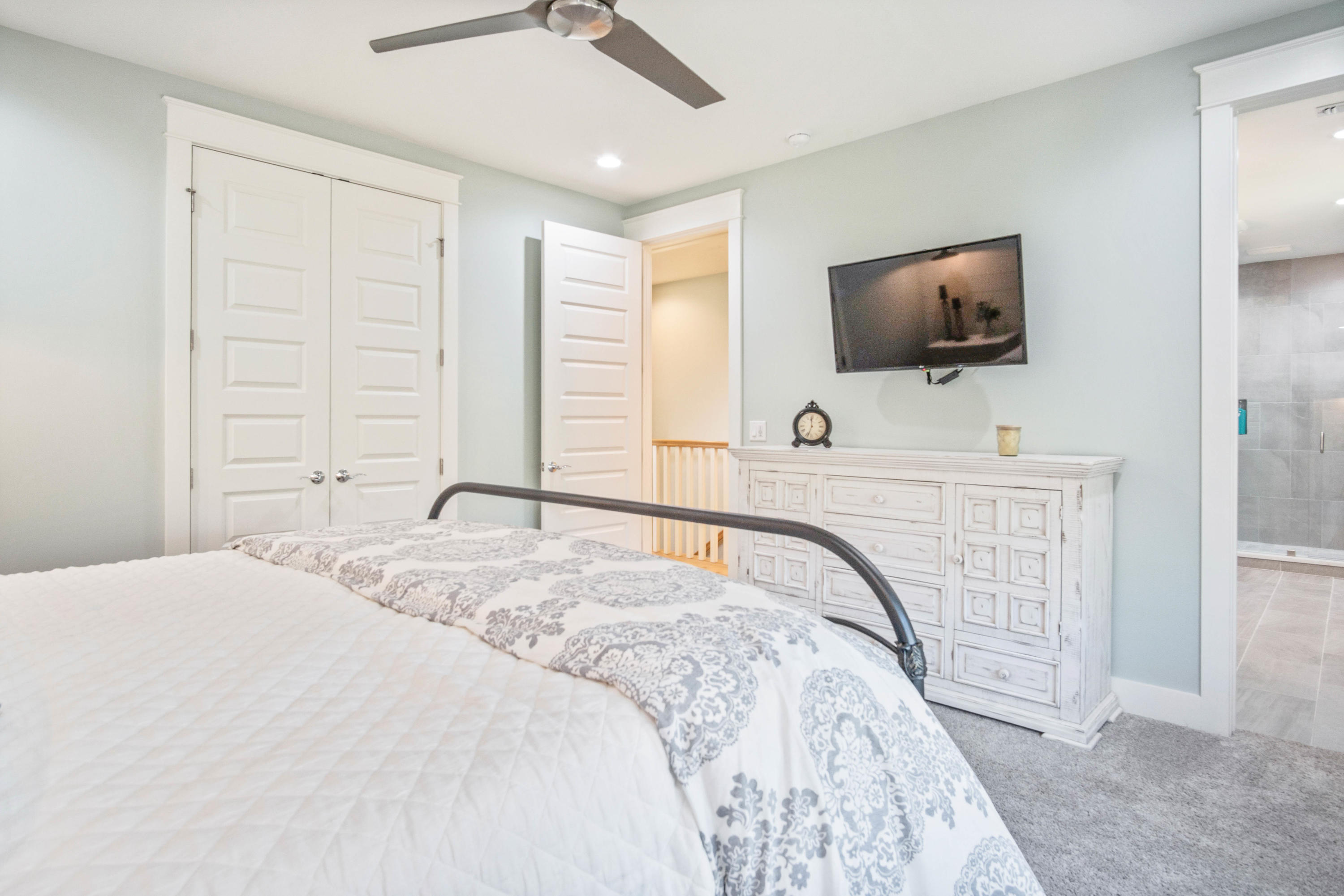 265 Ridgewalk Circle Santa Rosa Beach, FL 32459 - Photo 29 of 62 a bedroom with a bed and a flat screen tv