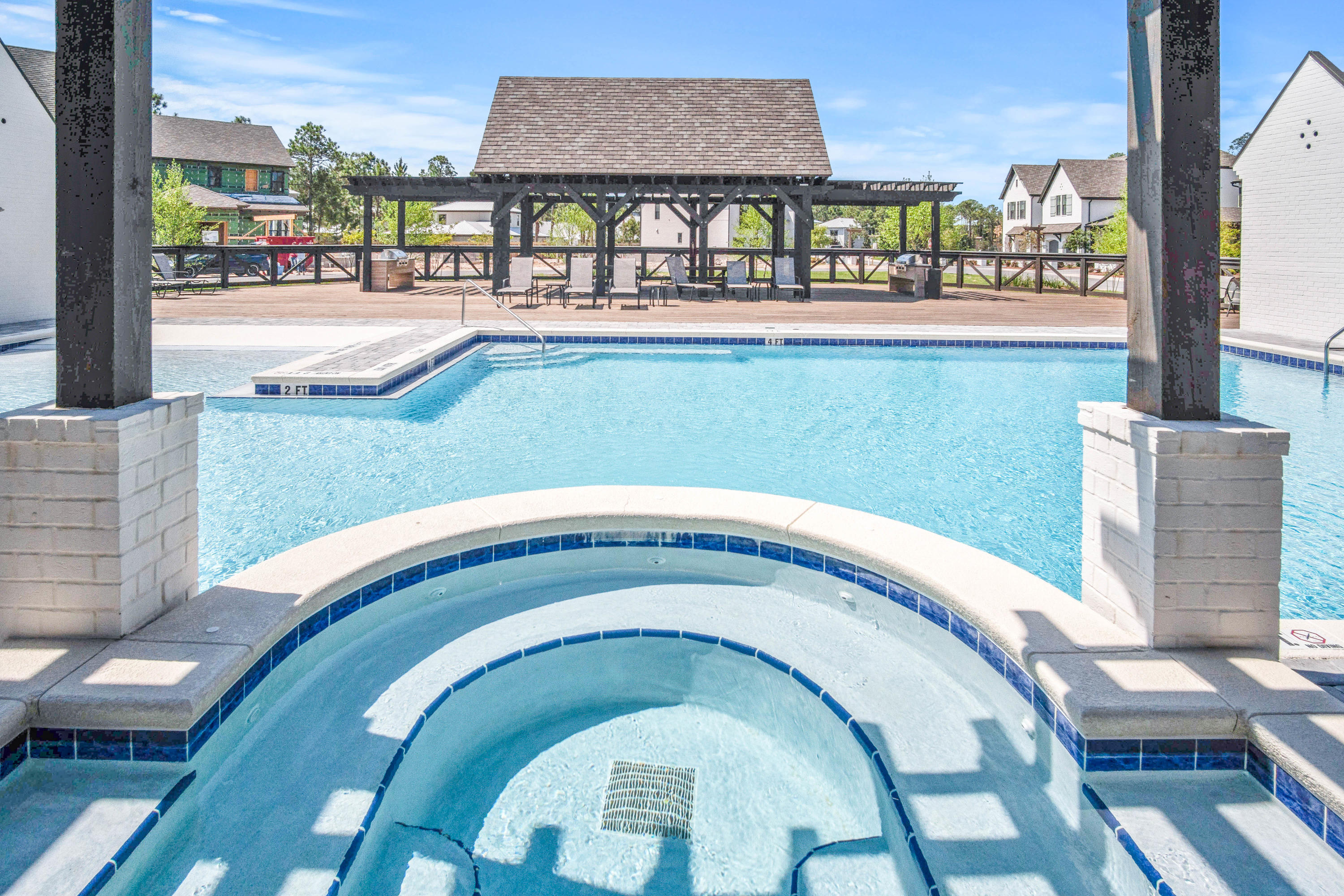 265 Ridgewalk Circle Santa Rosa Beach, FL 32459 - Photo 55 of 62 a swimming pool with outdoor seating and yard