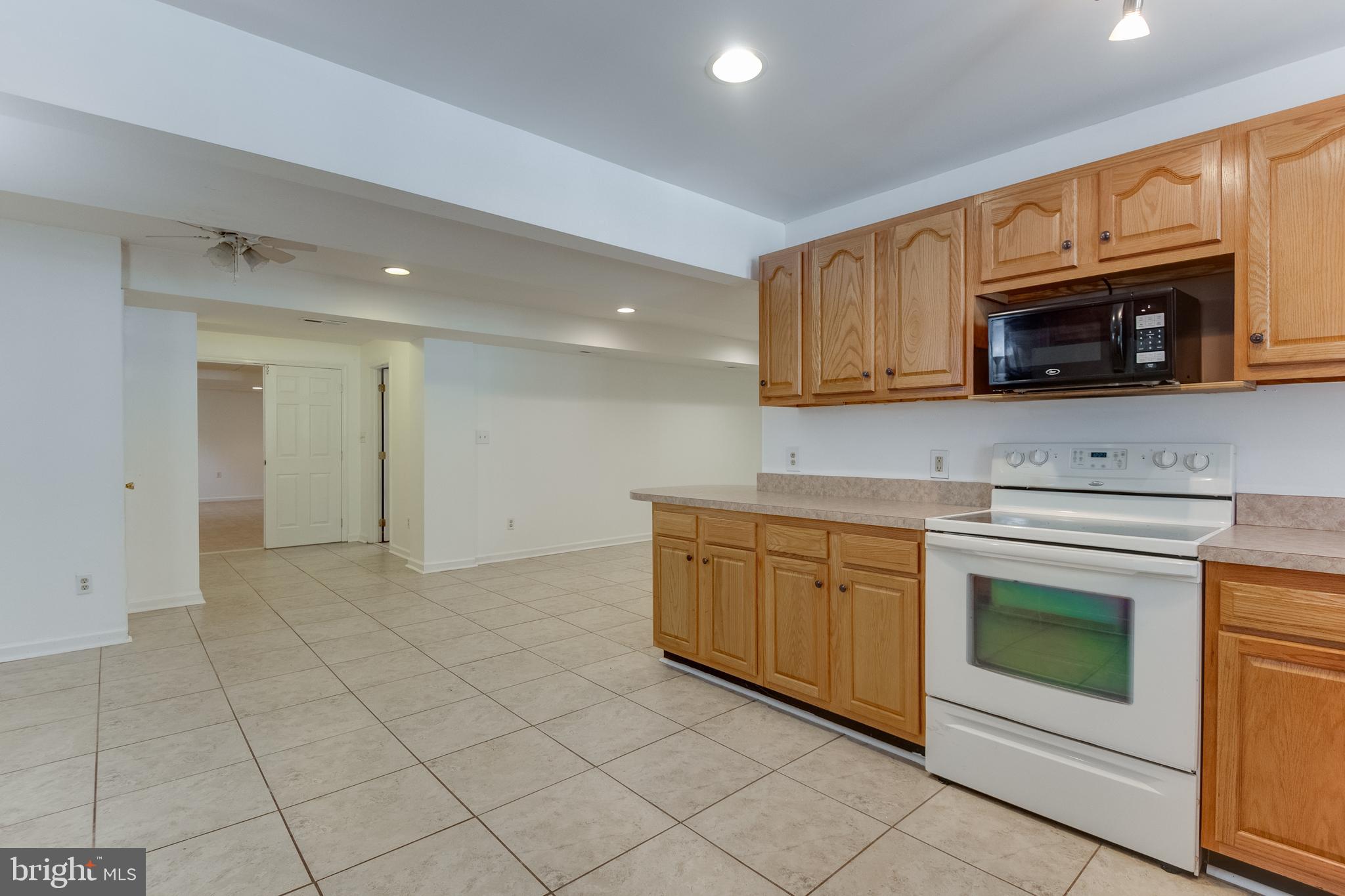 8305 Ventnor Road Pasadena, MD 21122 - Photo 44 of 70 kitchen looking into dining area & living room