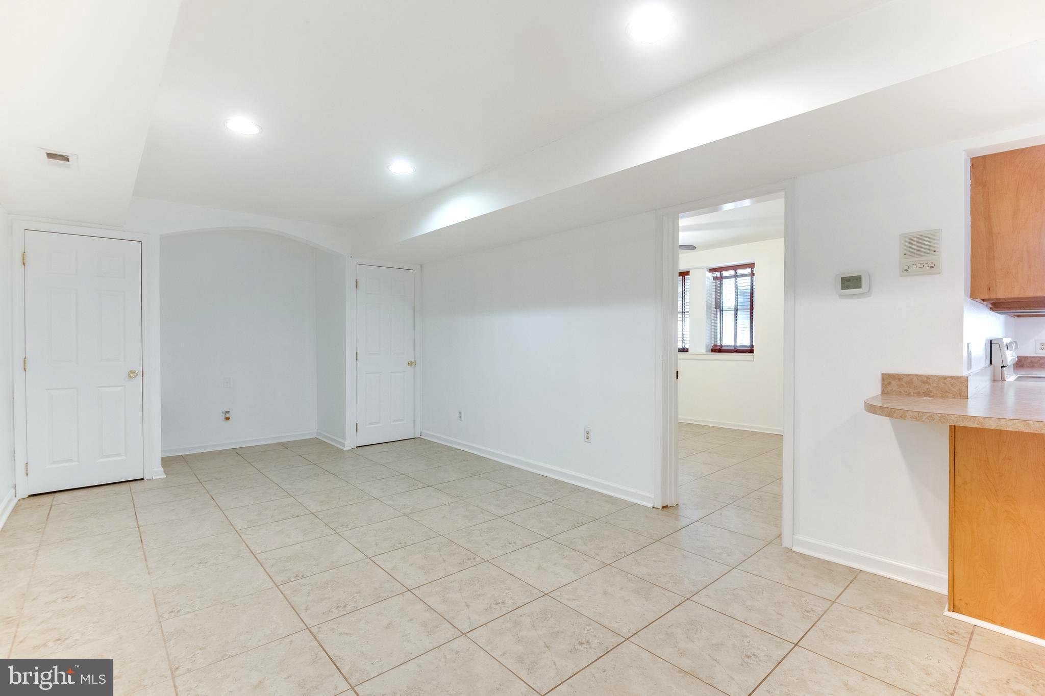 8305 Ventnor Road Pasadena, MD 21122 - Photo 45 of 70 living room of in-law suite