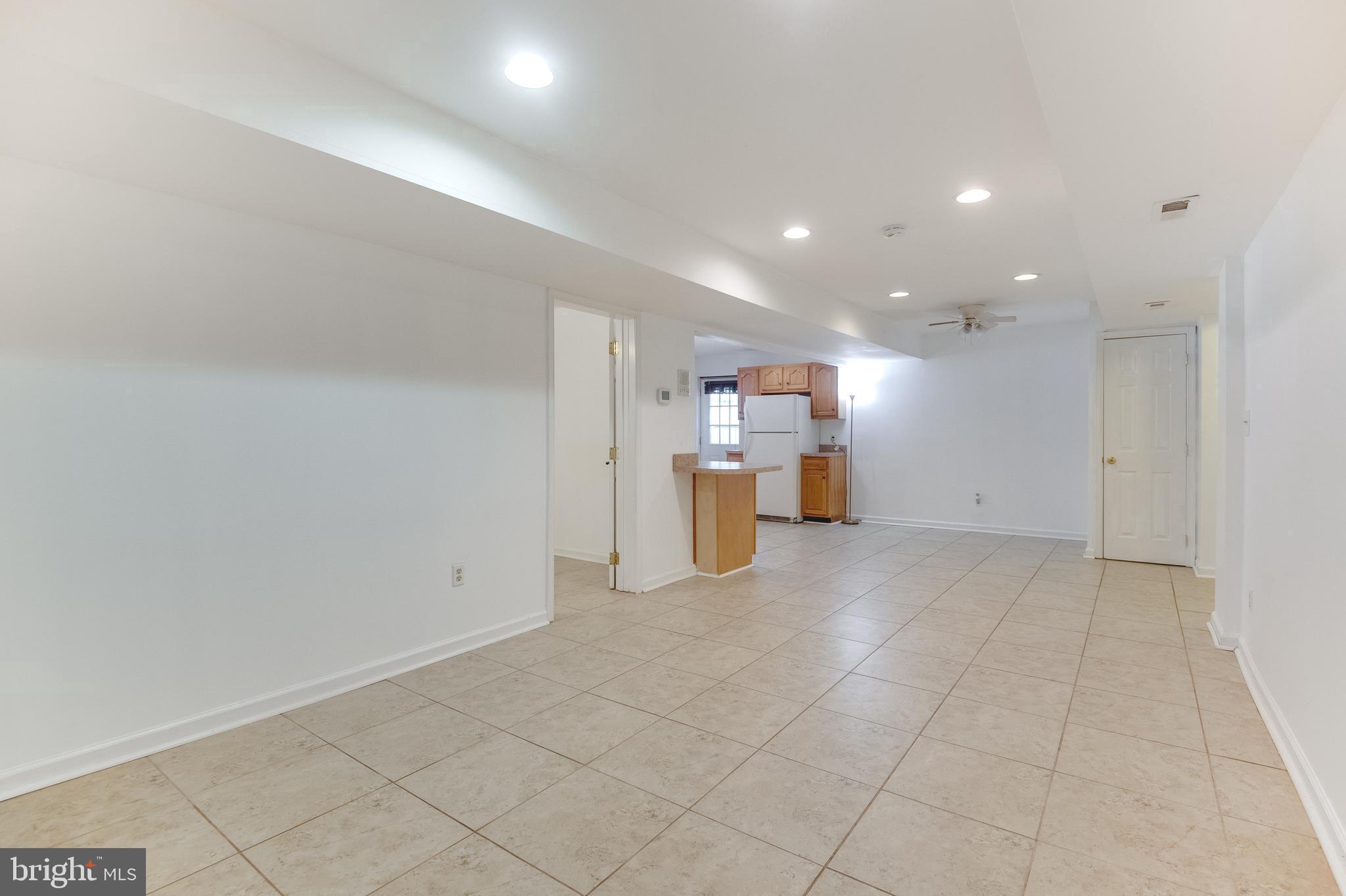 8305 Ventnor Road Pasadena, MD 21122 - Photo 46 of 70 living room & dining area in in-law suite