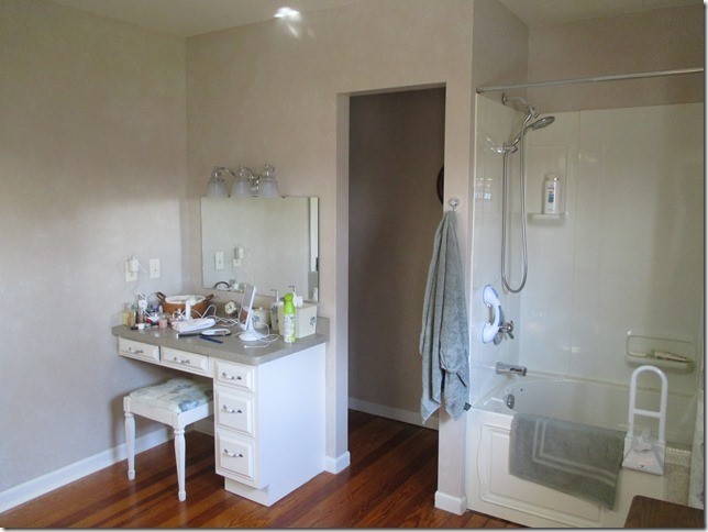 24890 Star Road Tampico, IL 61283 - Photo 15 of 26 a bathroom with a sink mirror and a shower