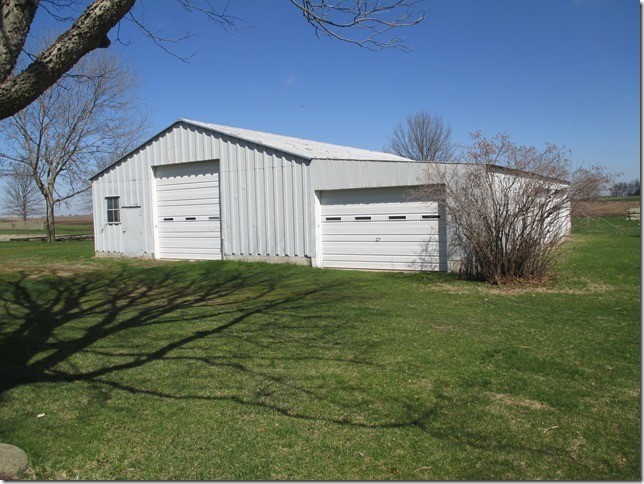 24890 Star Road Tampico, IL 61283 - Photo 20 of 26 a view of a backyard with large trees