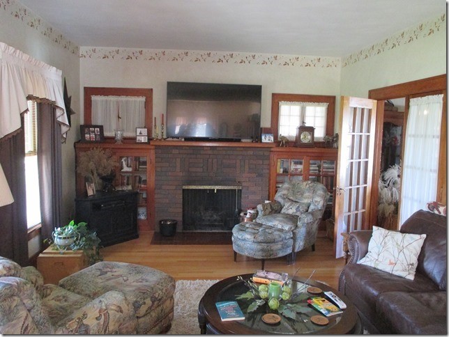 24890 Star Road Tampico, IL 61283 - Photo 4 of 26 a living room with furniture and a fireplace