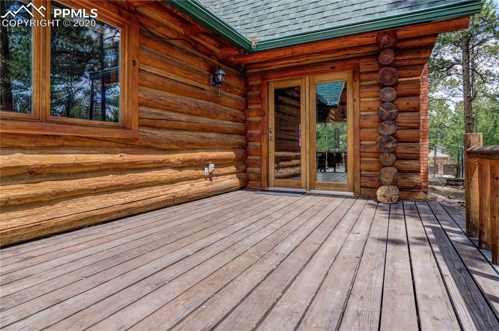 17940 Smugglers Road Monument, CO 80132 - Photo 35 of 40 Another porch! Door leads to family room