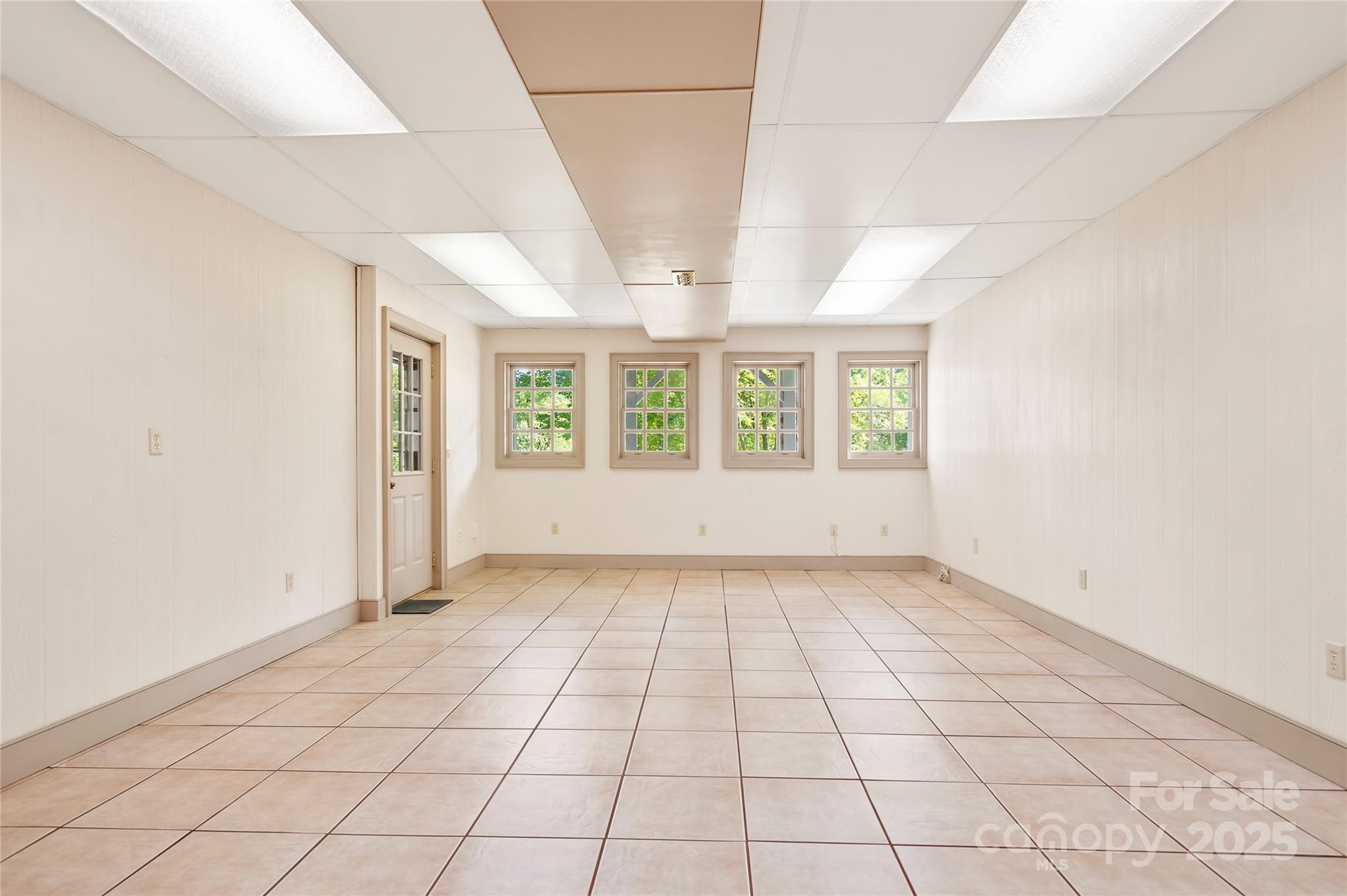 116 Sams Branch Road Candler, NC 28715 - Photo 28 of 47 an empty room with windows
