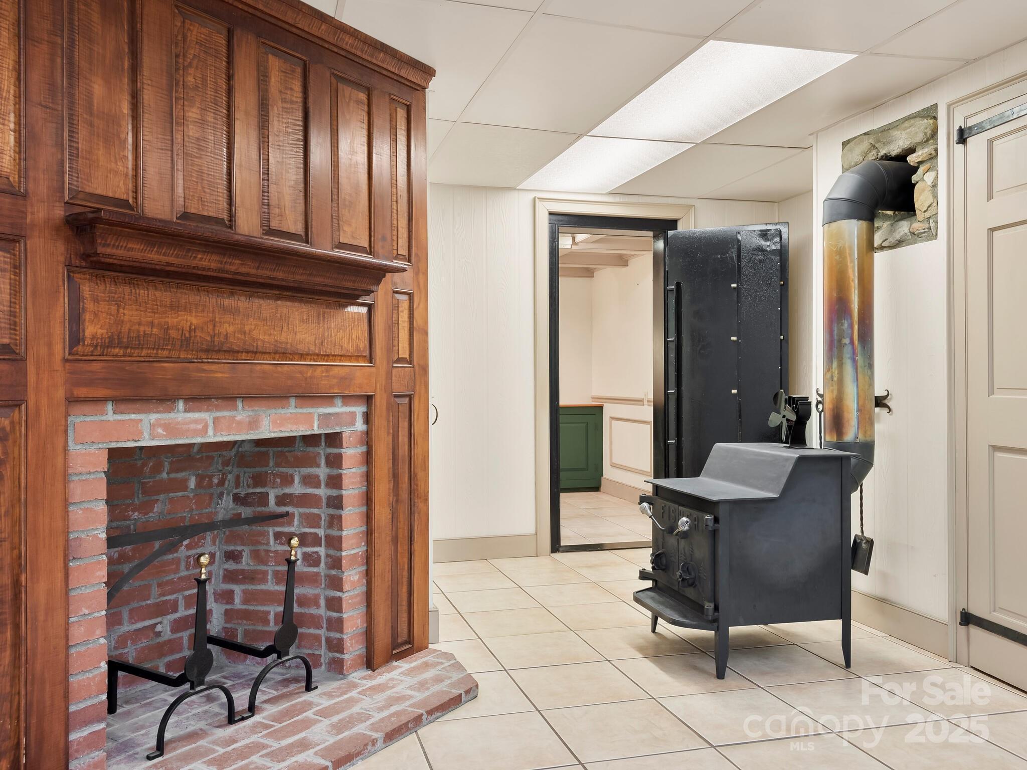 116 Sams Branch Road Candler, NC 28715 - Photo 31 of 47 a view of a livingroom with furniture and a fireplace