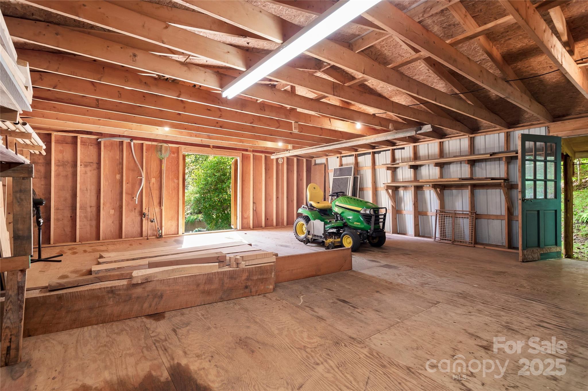 116 Sams Branch Road Candler, NC 28715 - Photo 40 of 47 a view of a room with windows and stairs