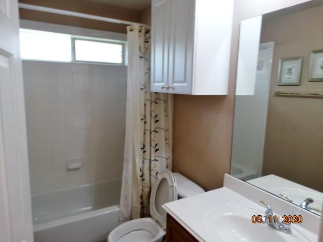 15785 Scenic Road Frisco, TX 75035 - Photo 17 of 21 a bathroom with a bathtub and shower