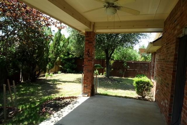15785 Scenic Road Frisco, TX 75035 - Photo 20 of 21 a view of a back yard of the house