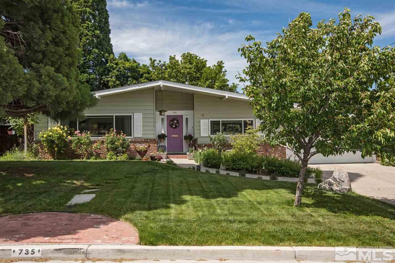 735 Brown Street Reno, NV 89509 - Photo 1 of 19 a front view of a house with a yard
