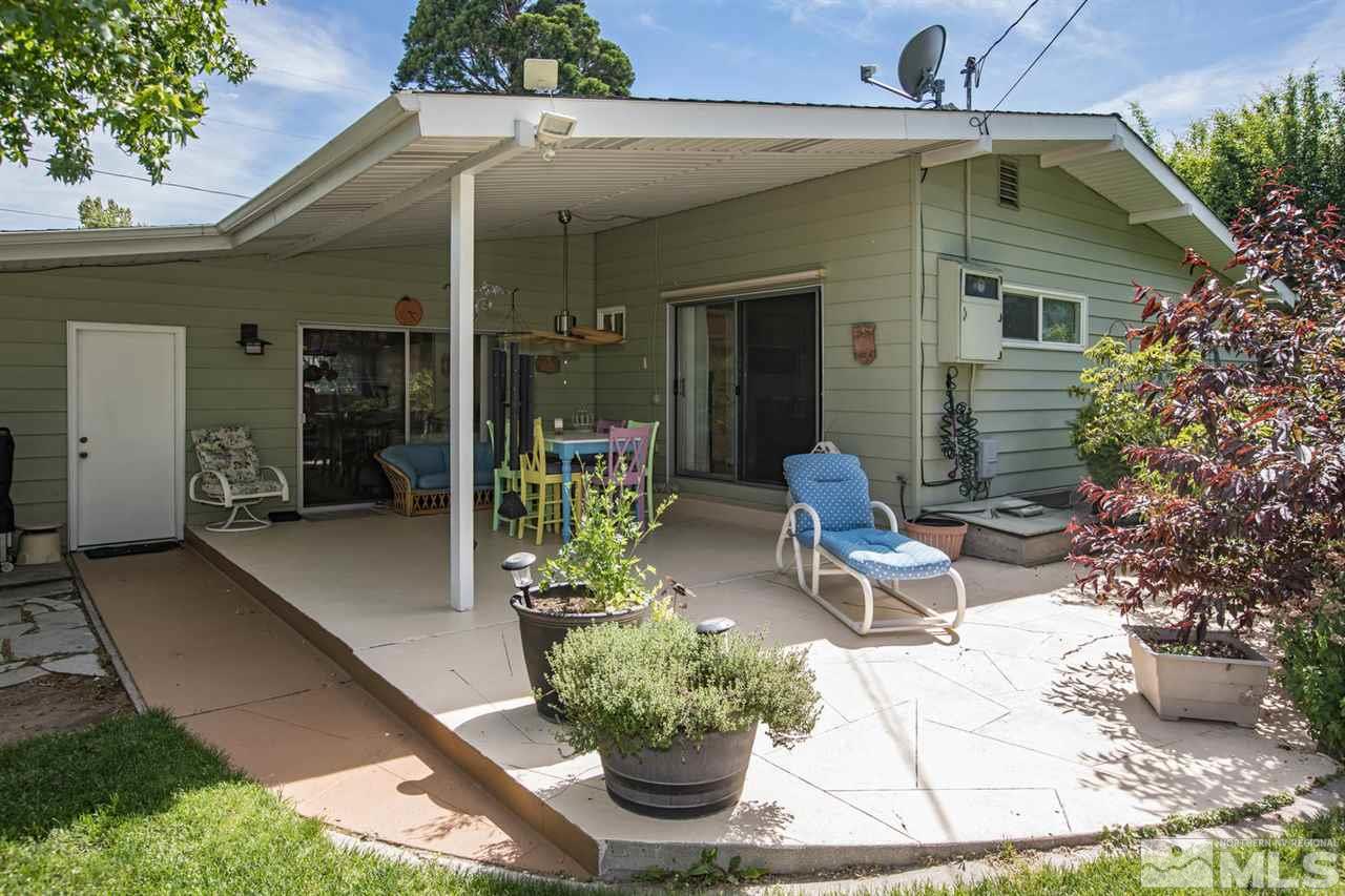 735 Brown Street Reno, NV 89509 - Photo 17 of 19 a front view of a house with outdoor seating