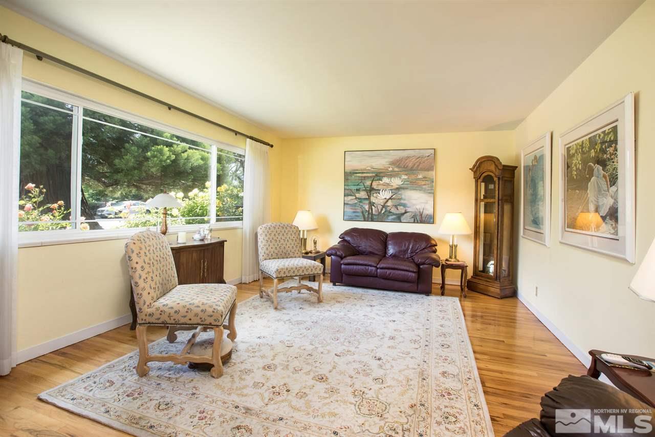 735 Brown Street Reno, NV 89509 - Photo 4 of 19 a living room with furniture and a large window
