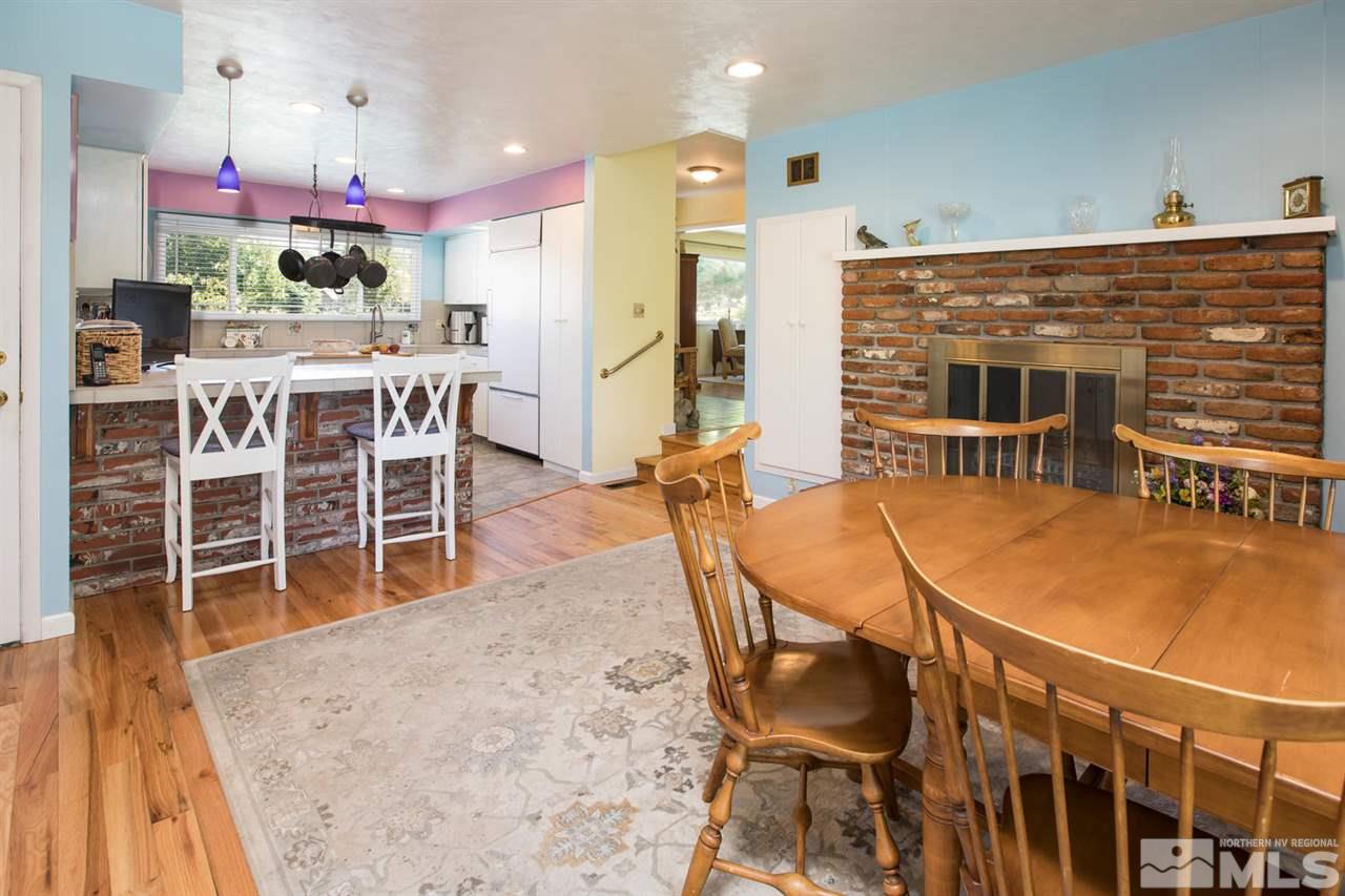 735 Brown Street Reno, NV 89509 - Photo 7 of 19 a dining room with furniture and wooden floor