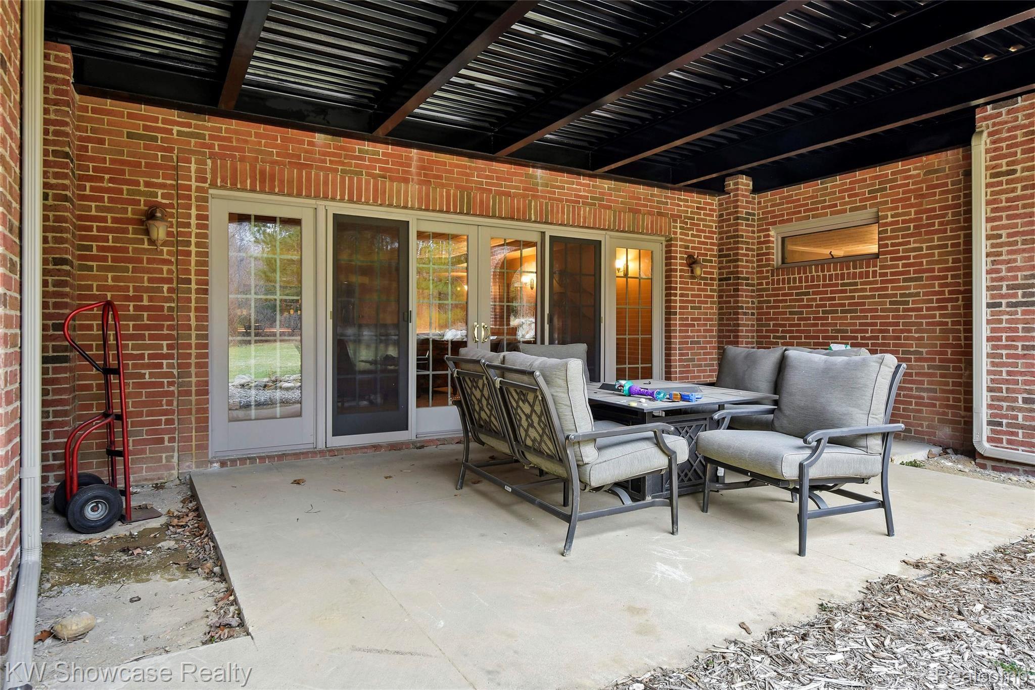 2828 Porter Road White Lake, MI 48383 - Photo 9 of 75 Patio space to extend your entertaining needs from your finished W/O Basement