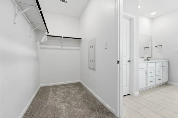 a view of a hallway with seating area