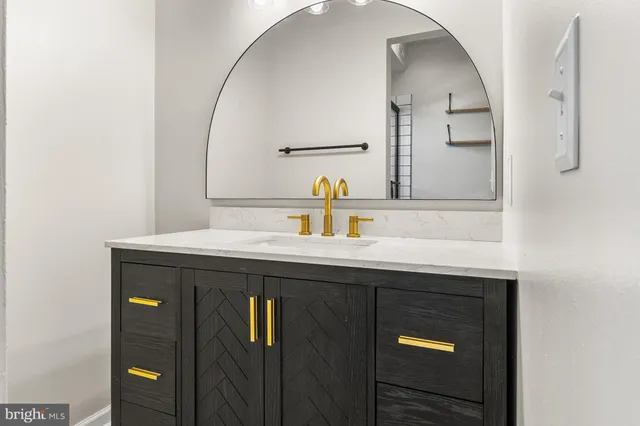 a view of a patio with chairs and a table