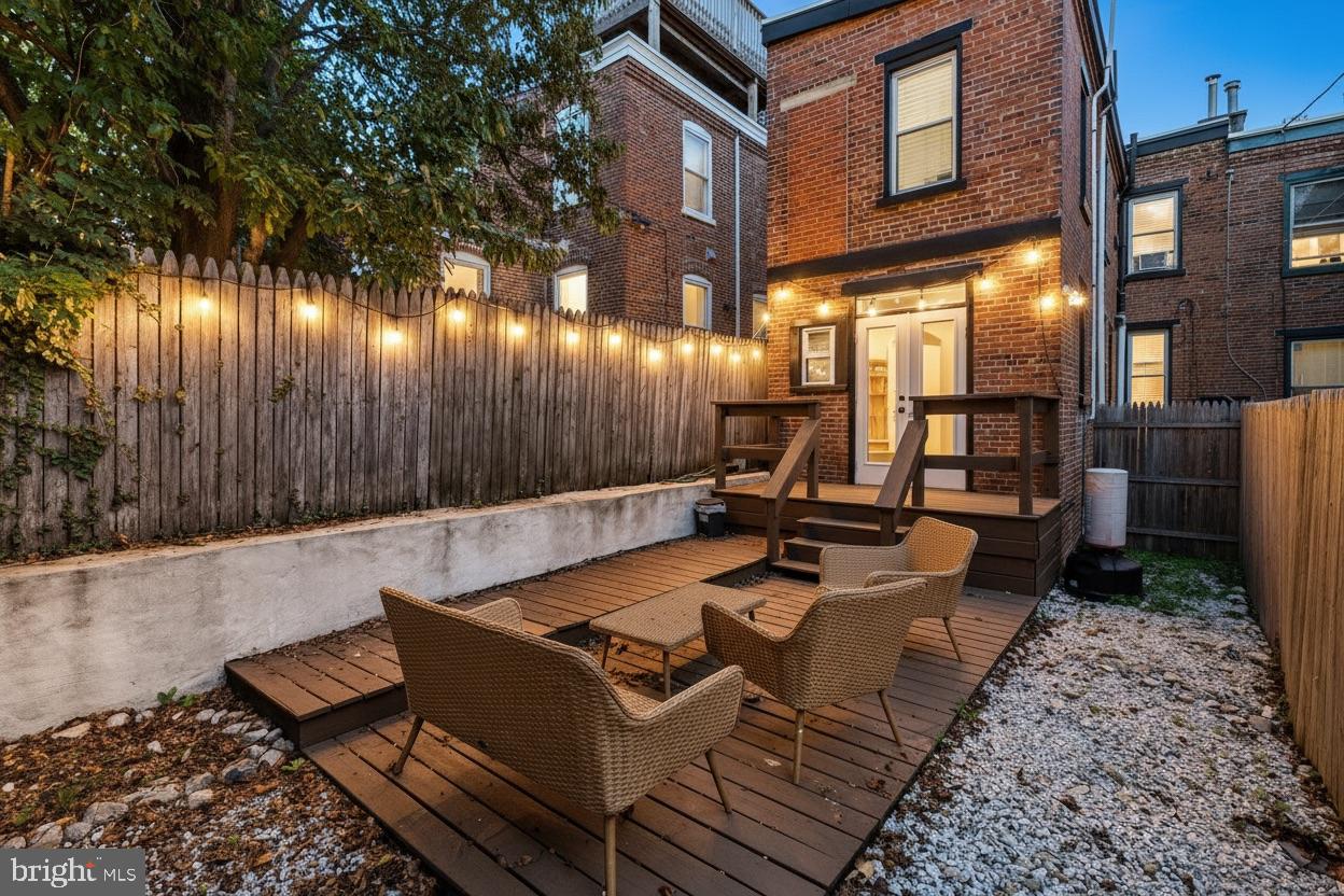 1204 West 8th Street Wilmington, DE 19806 - Photo 31 of 35 a view of a patio with chairs and a table