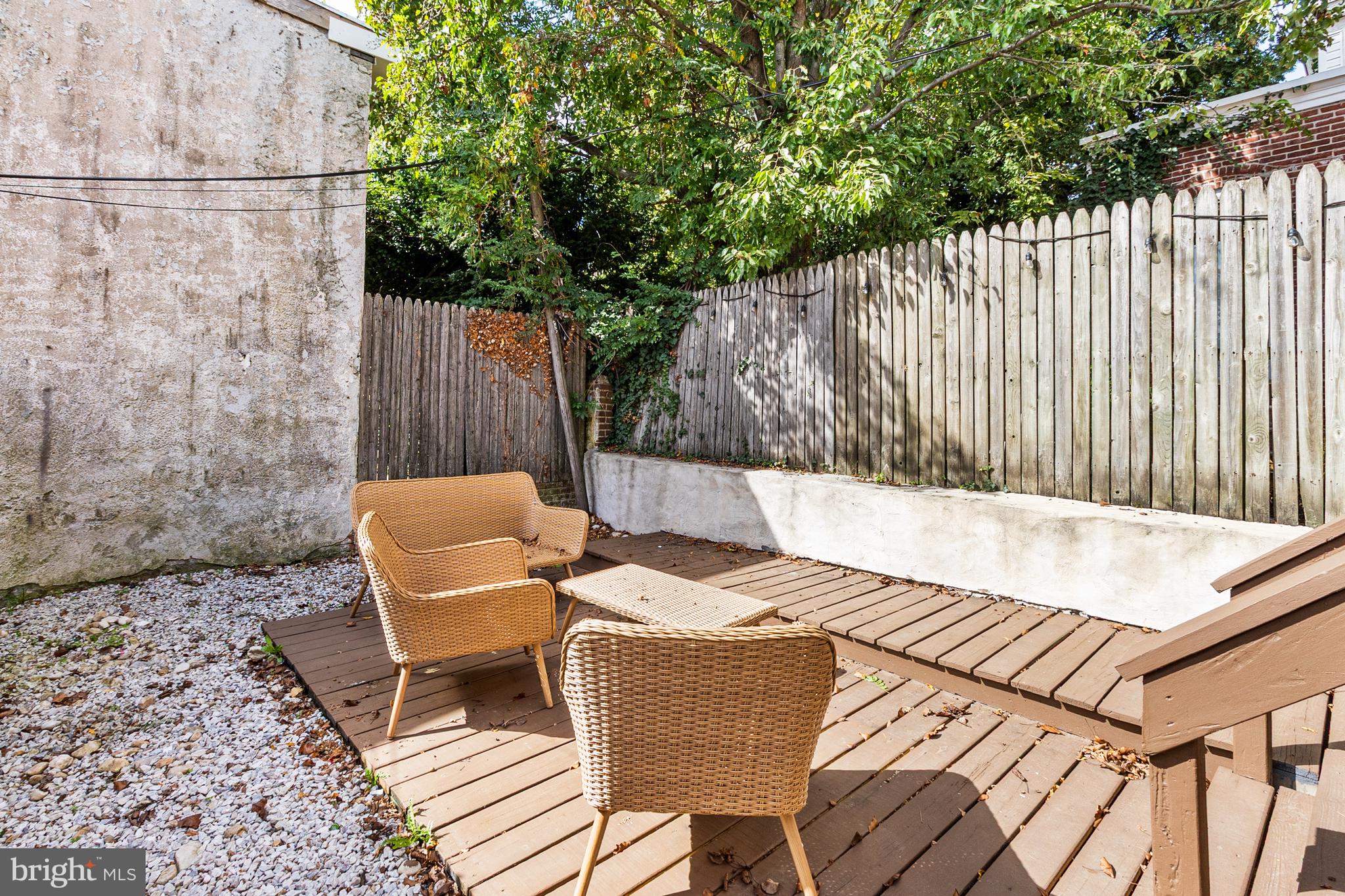 1204 West 8th Street Wilmington, DE 19806 - Photo 34 of 35 a backyard of a house with table and chairs