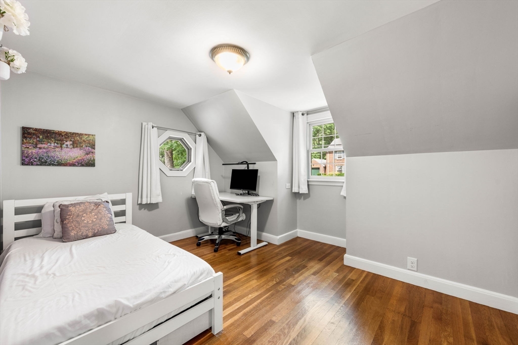 166 Hillcrest Road Needham, MA 02492 - Photo 22 of 36 a bedroom with a bed and a tv