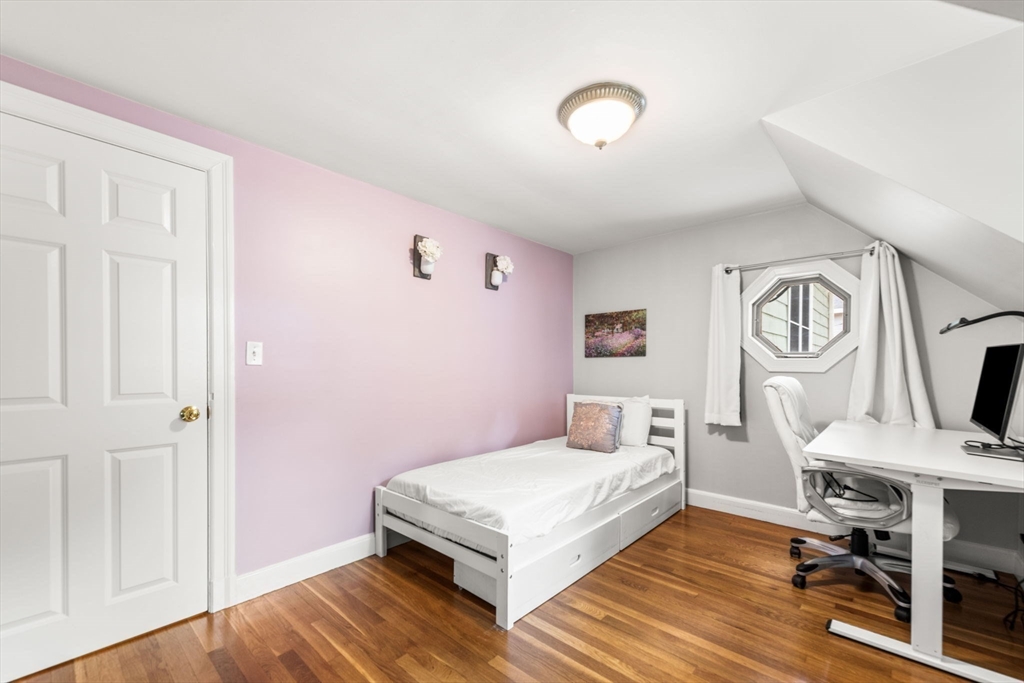 166 Hillcrest Road Needham, MA 02492 - Photo 23 of 36 a bed room with a bed and a chair