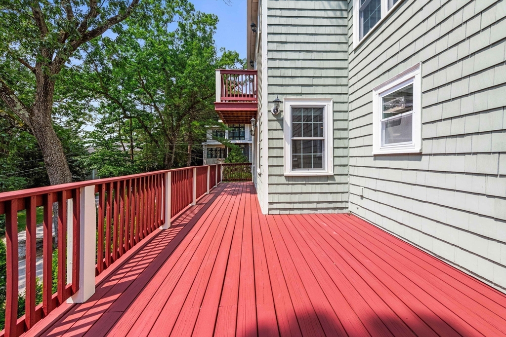 166 Hillcrest Road Needham, MA 02492 - Photo 28 of 36 a view of deck with wooden floor and fence